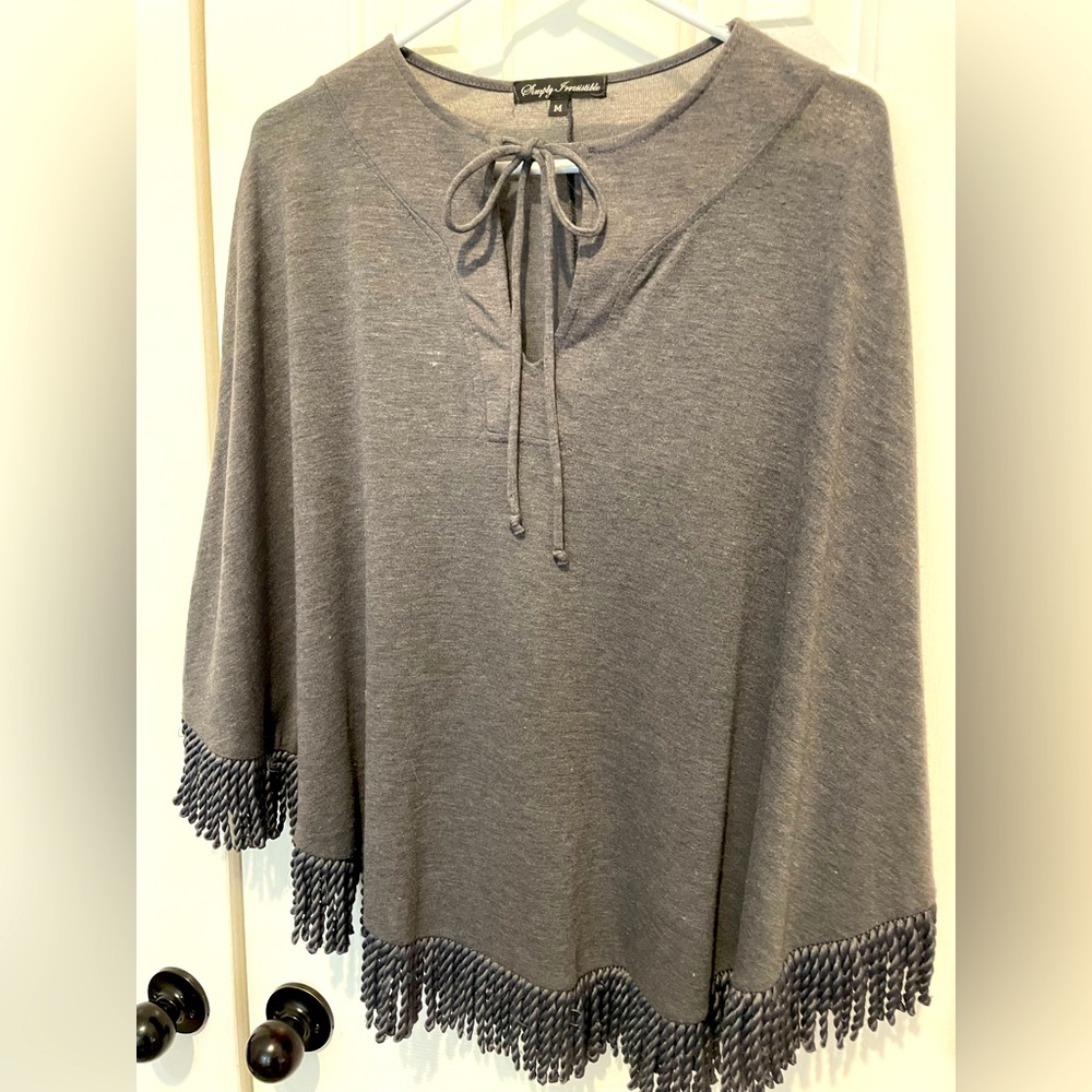 Gray fringed poncho